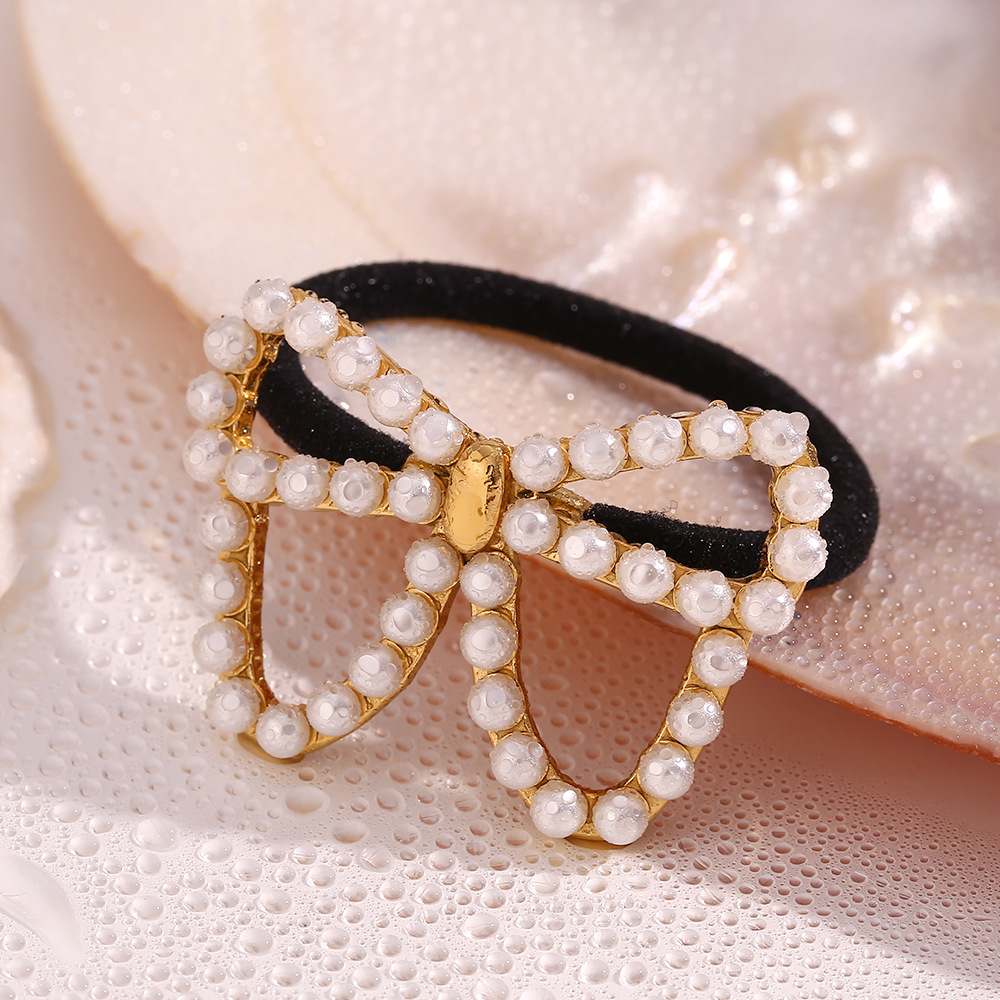 Pearl Bow Pony Cuff