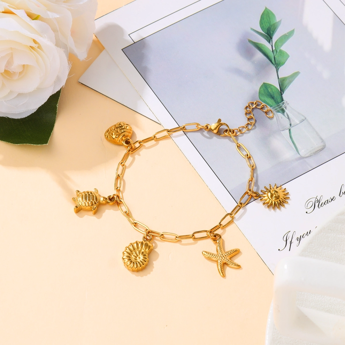 Turtle, Sun and Starfish Charm Bracelet