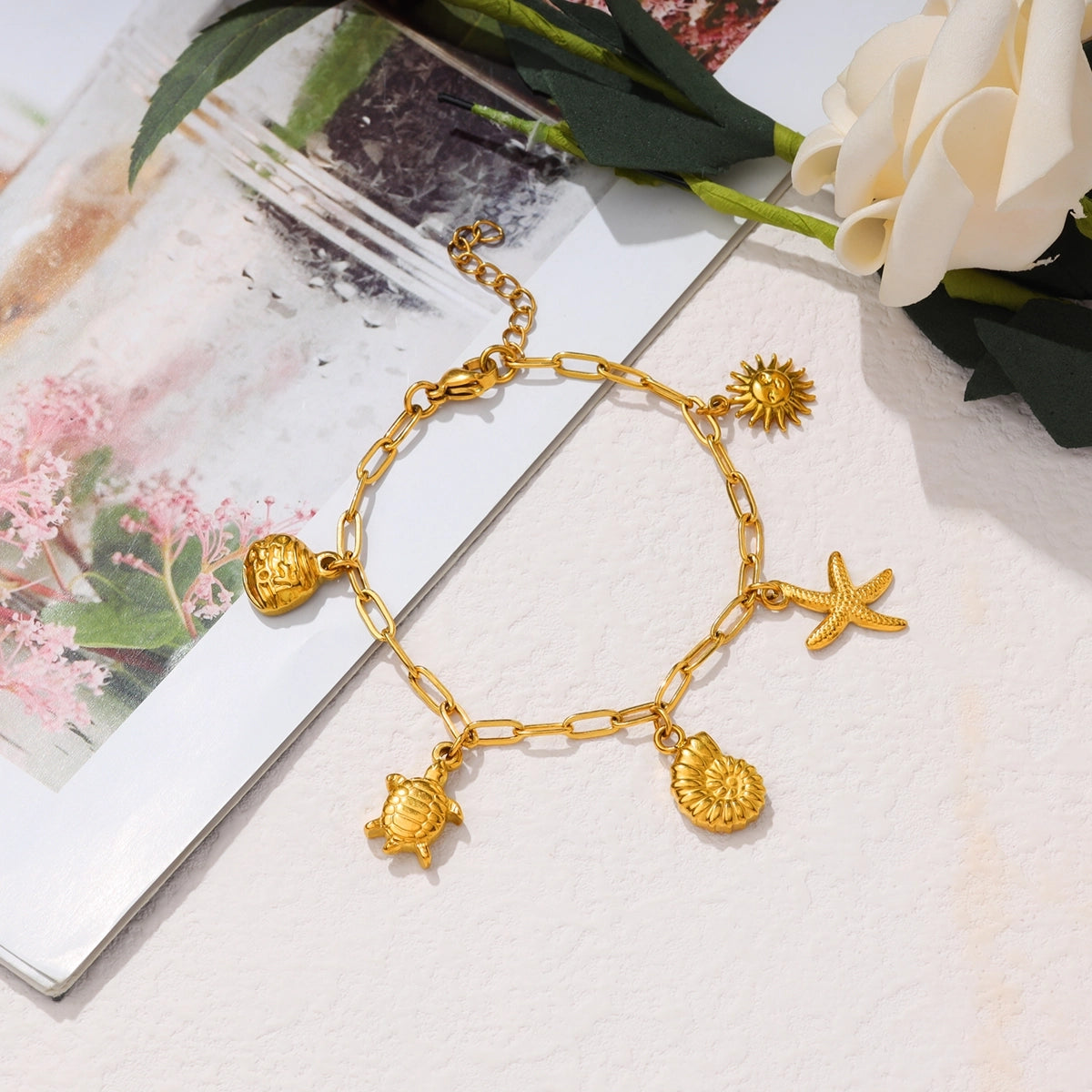 Turtle, Sun and Starfish Charm Bracelet