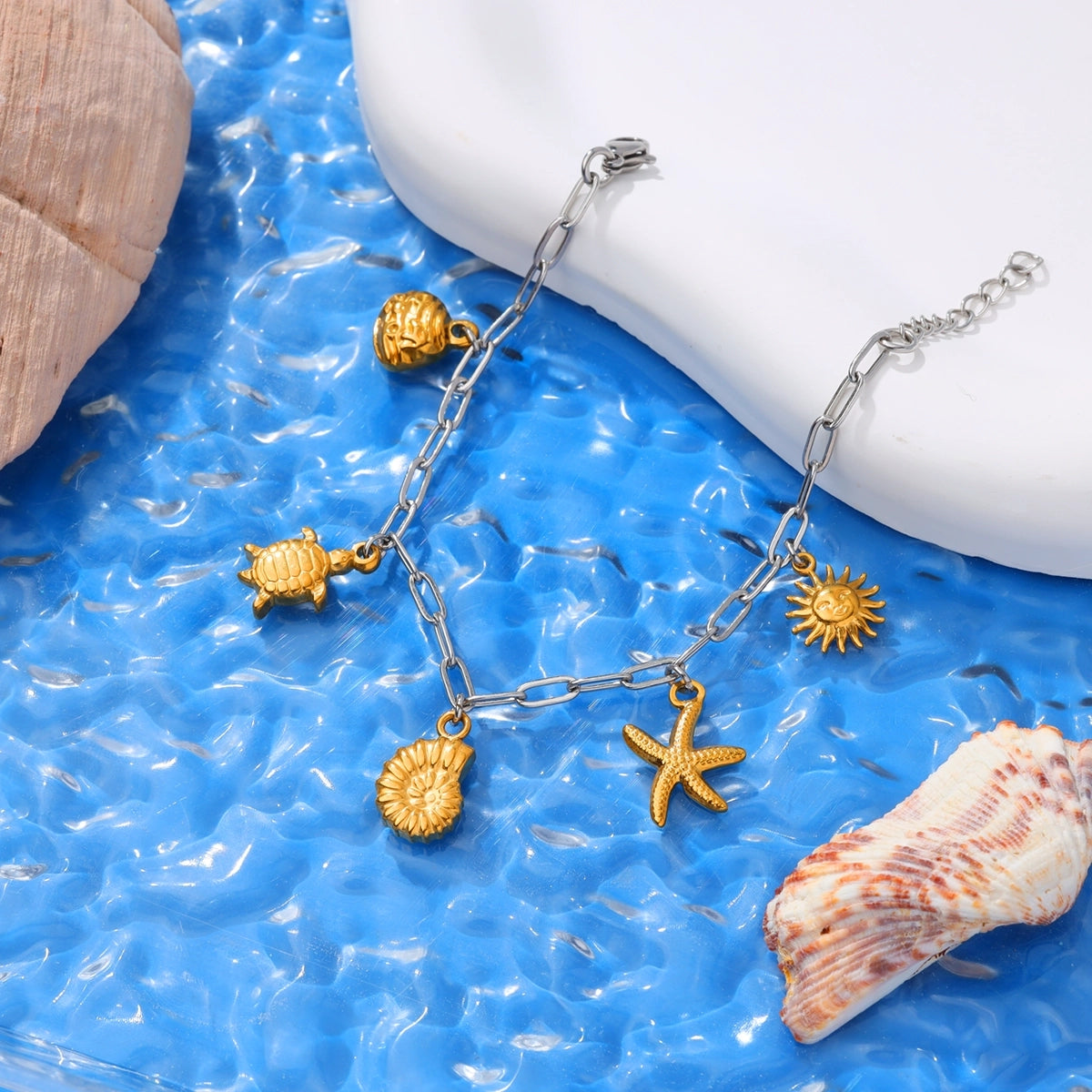 Turtle, Sun and Starfish Charm Bracelet