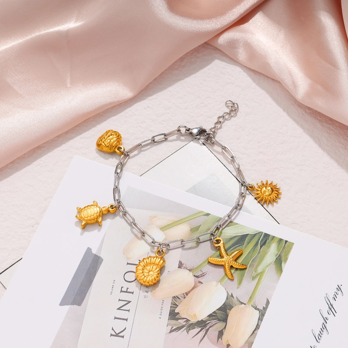 Turtle, Sun and Starfish Charm Bracelet