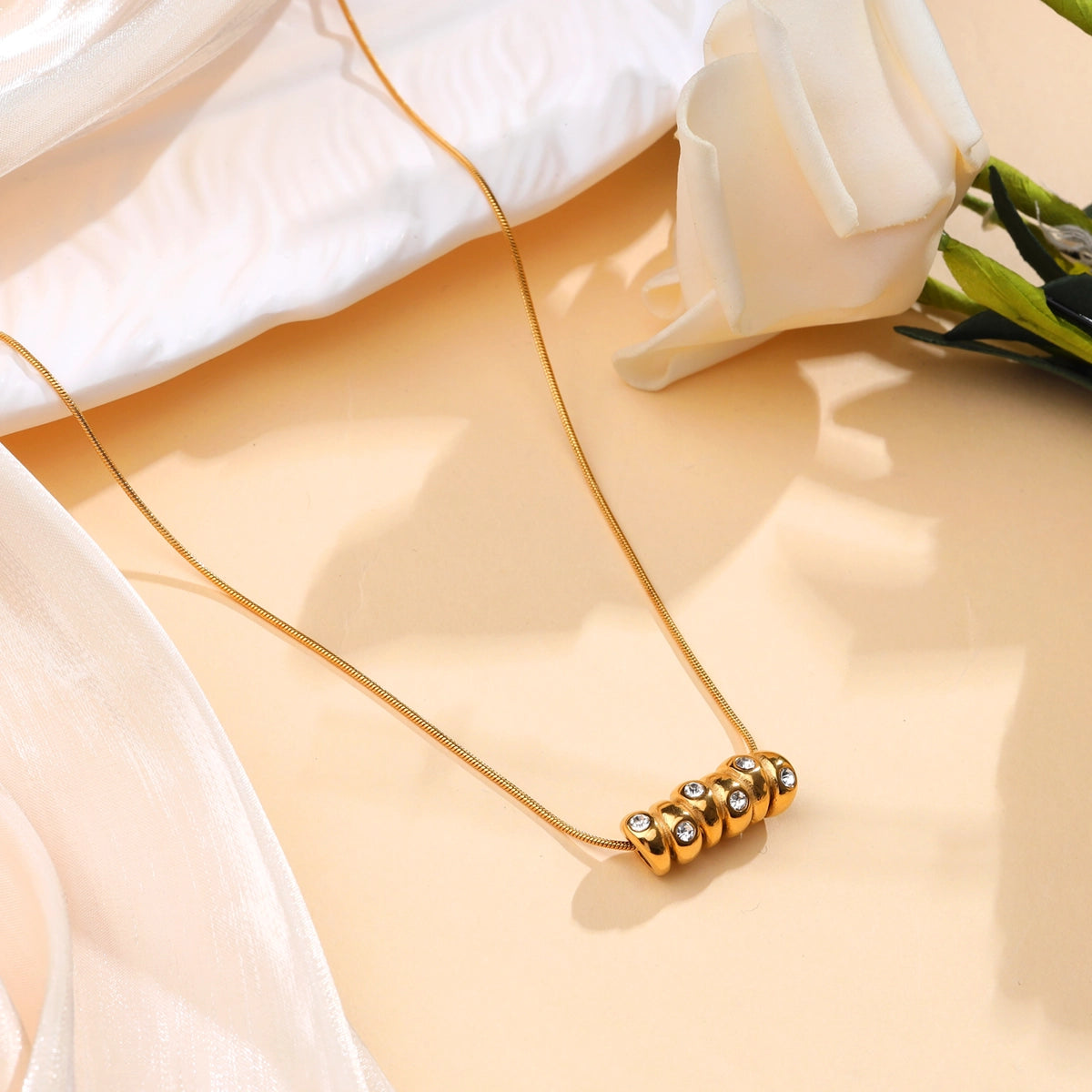 Gold Beads and Zircon Necklace