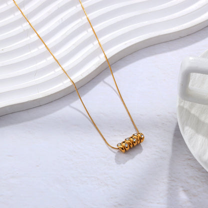 Gold Beads and Zircon Necklace